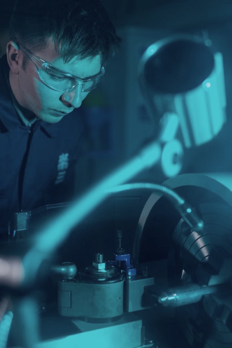 BMCA technician calibrating laboratory equipment